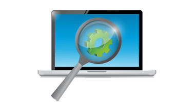 computer screen and magnifying glass